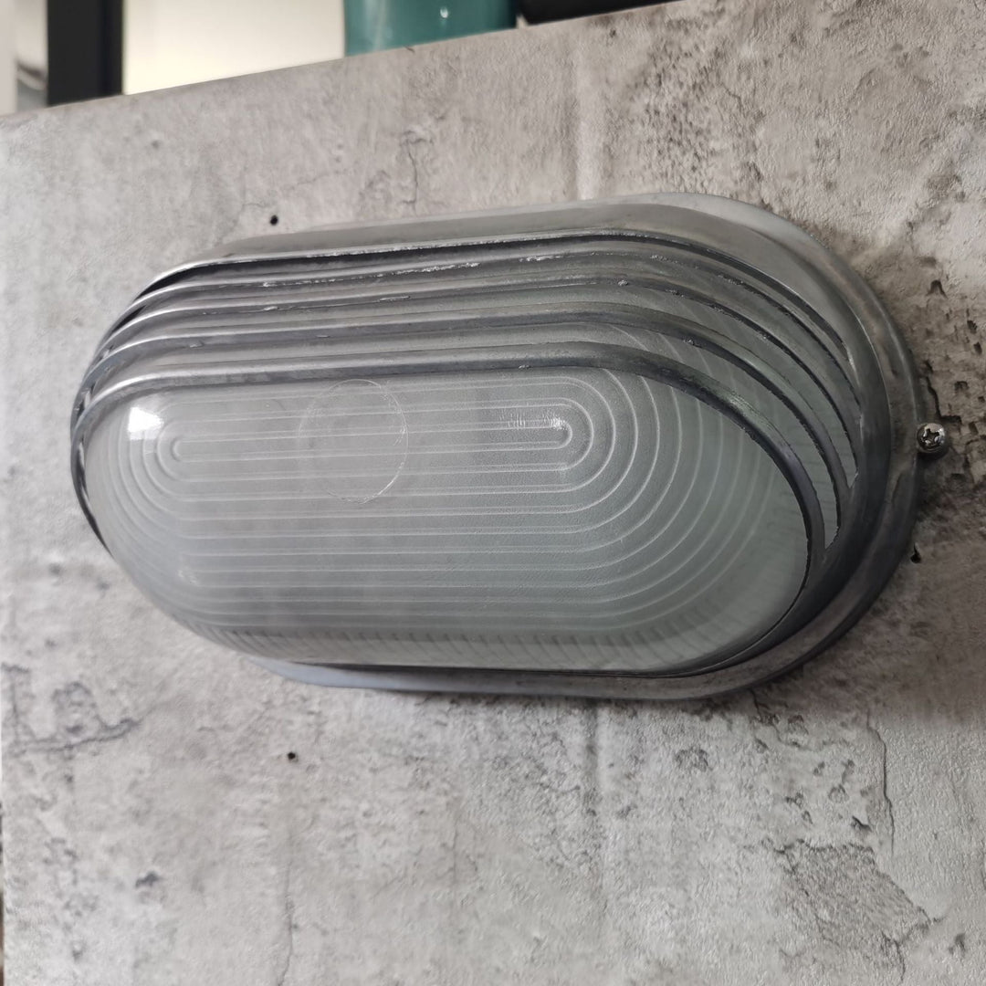 Contemporary Industrial Waterproof Aluminum Glass Frosted Oval Striped 1-Light Wall Sconce Lamp For Outdoor Patio | Kalsten