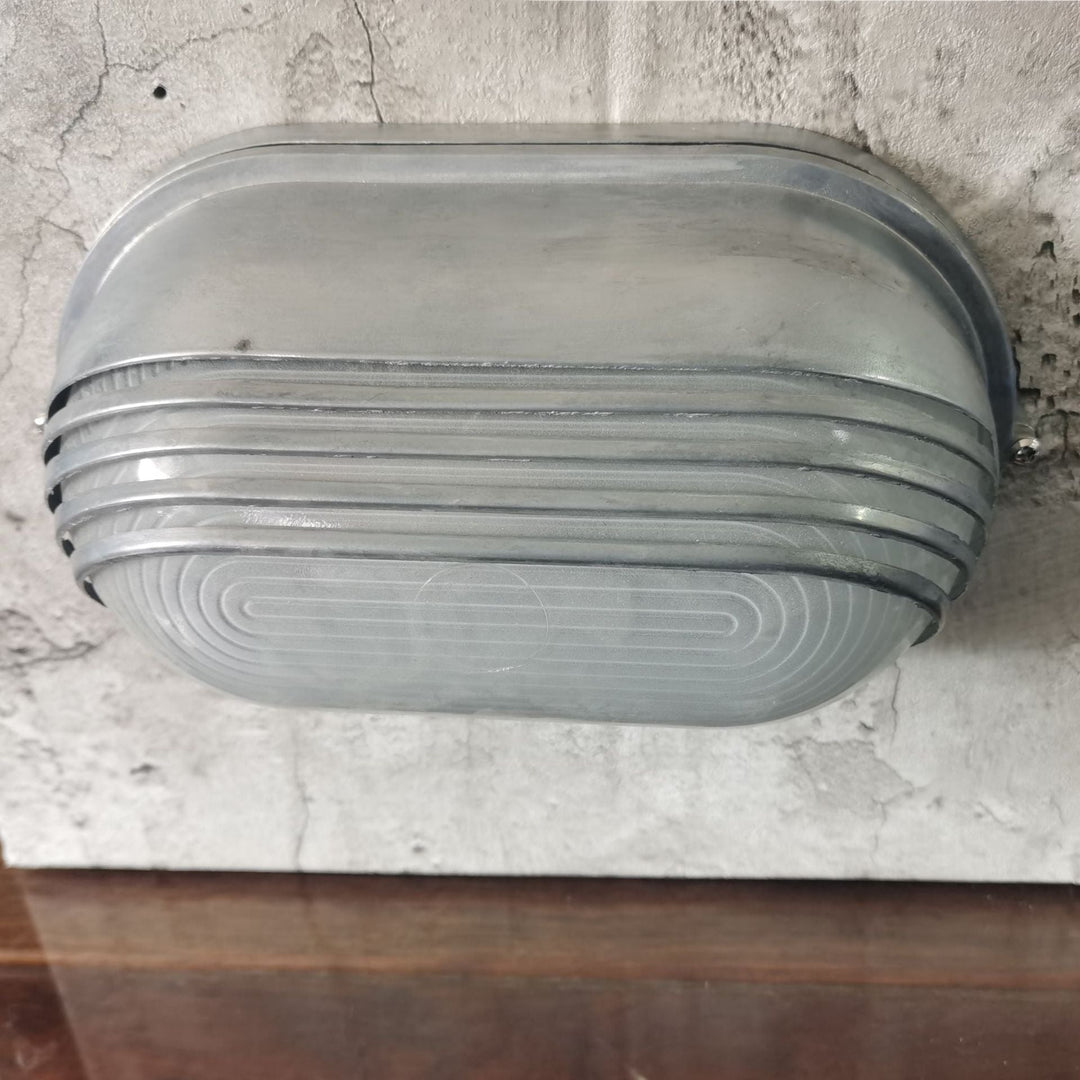 Contemporary Industrial Waterproof Aluminum Glass Frosted Oval Striped 1-Light Wall Sconce Lamp For Outdoor Patio | Kalsten