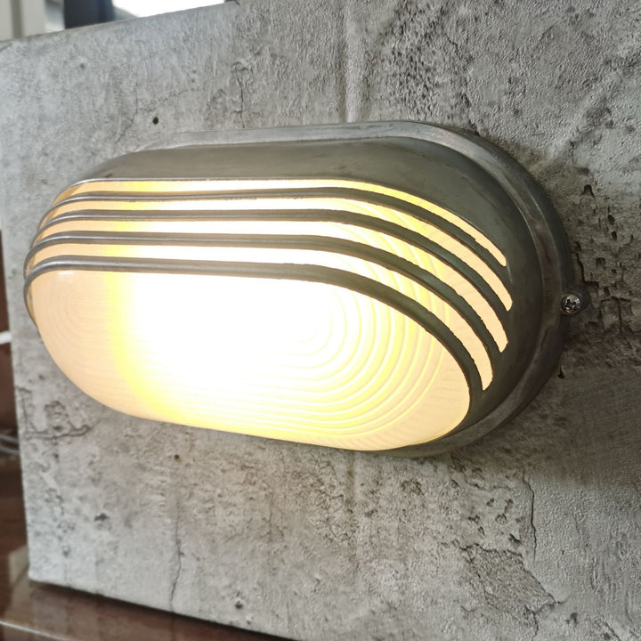 Contemporary Industrial Waterproof Aluminum Glass Frosted Oval Striped 1-Light Wall Sconce Lamp For Outdoor Patio | Kalsten