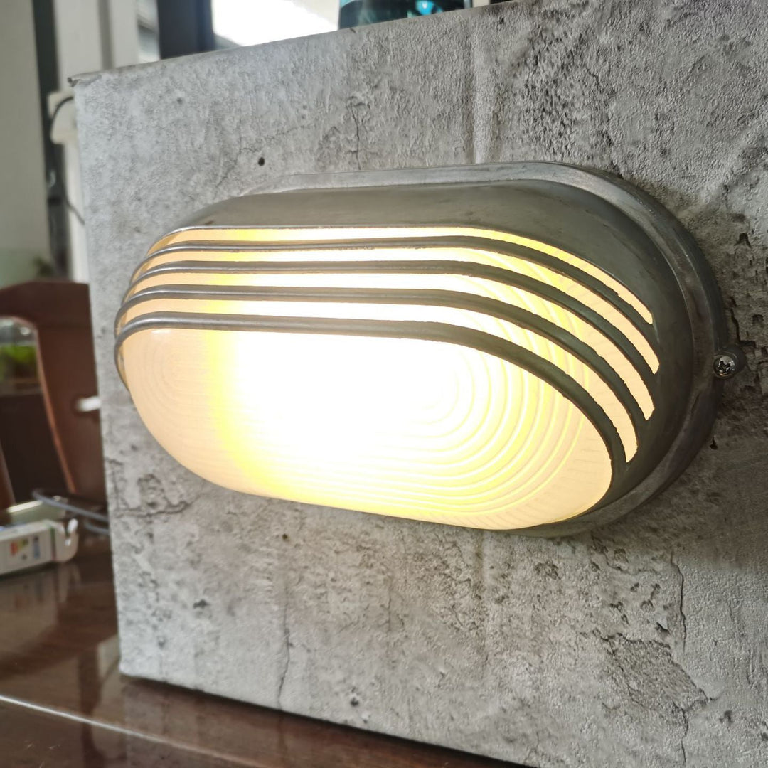 Contemporary Industrial Waterproof Aluminum Glass Frosted Oval Striped 1-Light Wall Sconce Lamp For Outdoor Patio | Kalsten