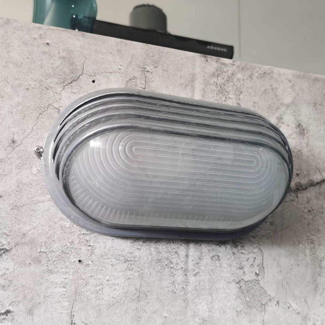 Contemporary Industrial Waterproof Aluminum Glass Frosted Oval Striped 1-Light Wall Sconce Lamp For Outdoor Patio | Kalsten