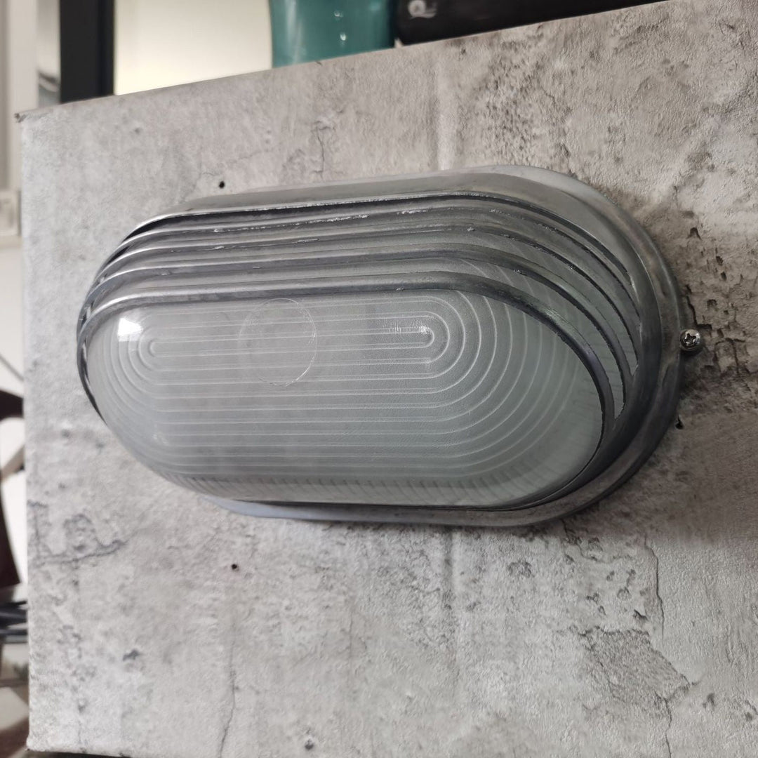 Contemporary Industrial Waterproof Aluminum Glass Frosted Oval Striped 1-Light Wall Sconce Lamp For Outdoor Patio | Kalsten