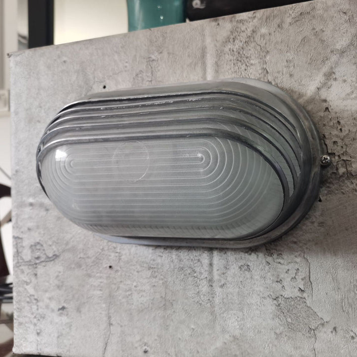 Contemporary Industrial Waterproof Aluminum Glass Frosted Oval Striped 1-Light Wall Sconce Lamp For Outdoor Patio | Kalsten
