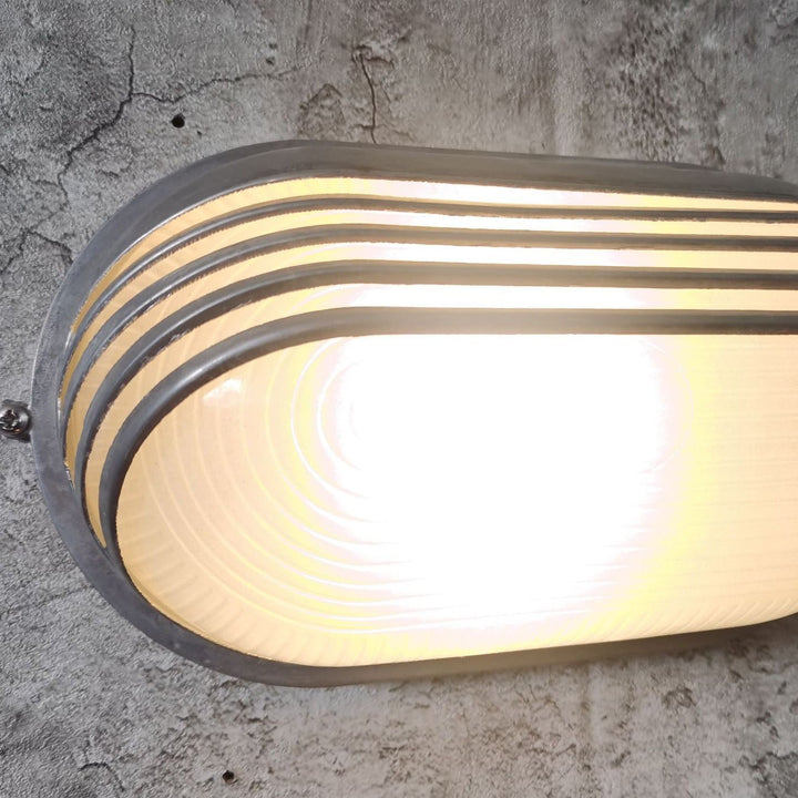Contemporary Industrial Waterproof Aluminum Glass Frosted Oval Striped 1-Light Wall Sconce Lamp For Outdoor Patio | Kalsten