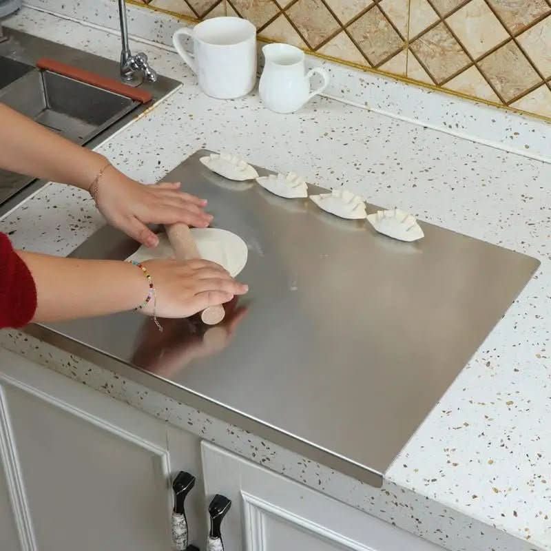 Kalsten | Stainless steel cutting board with non-slip underside & integrated lip