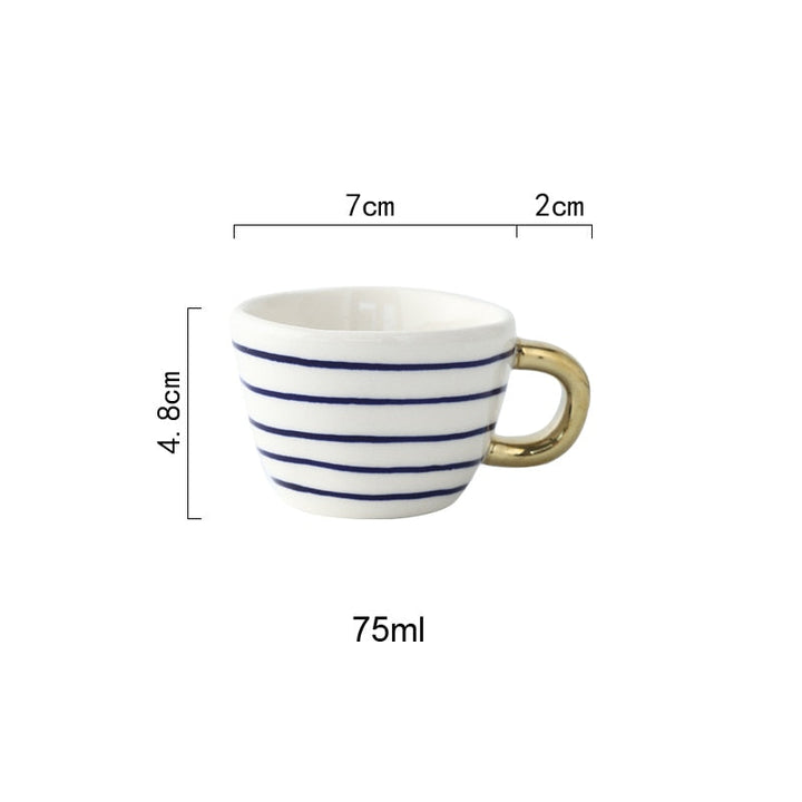 Kalsten | Cup with abstract geometric pattern and gold handle
