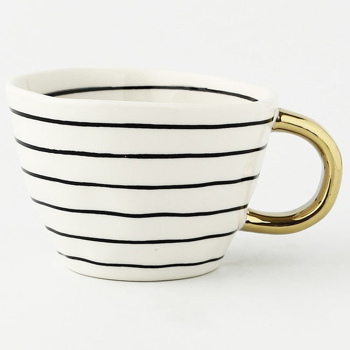 Kalsten | Cup with abstract geometric pattern and gold handle