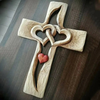 BowLift | Hand-carved wooden cross with intertwined hearts