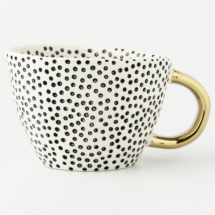 Kalsten | Cup with abstract geometric pattern and gold handle