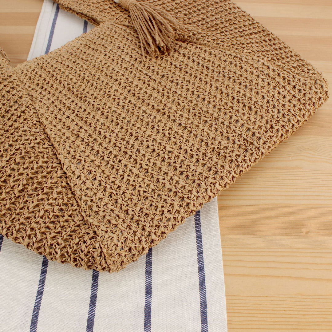 Beach bag made of natural weave with elegant leather accents Kalsten