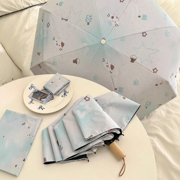Women's compact folding umbrella with cute Kalsten motif