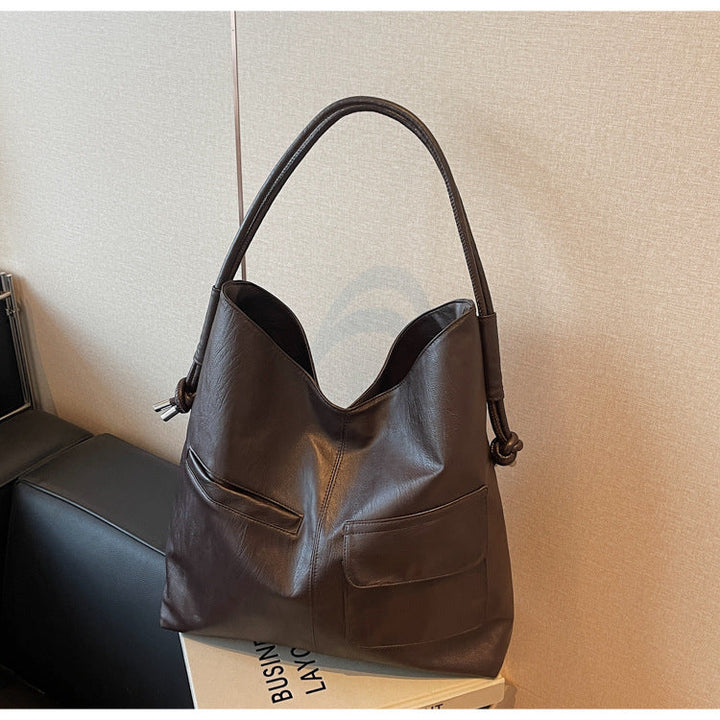 Casual tote bag with practical front pockets Kalsten