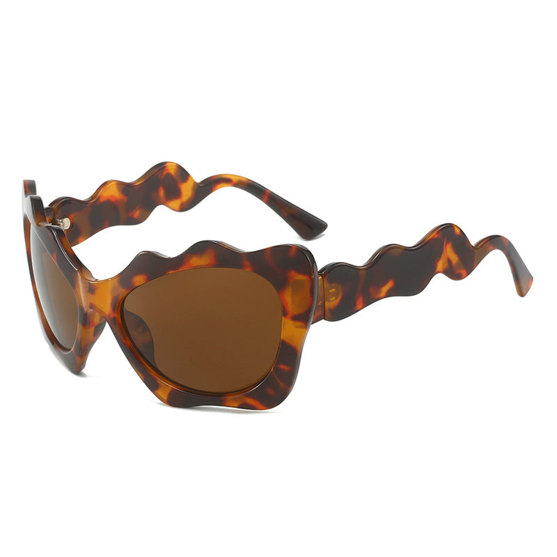 Ladies extravagant sunglasses with wavy frame design Kalsten