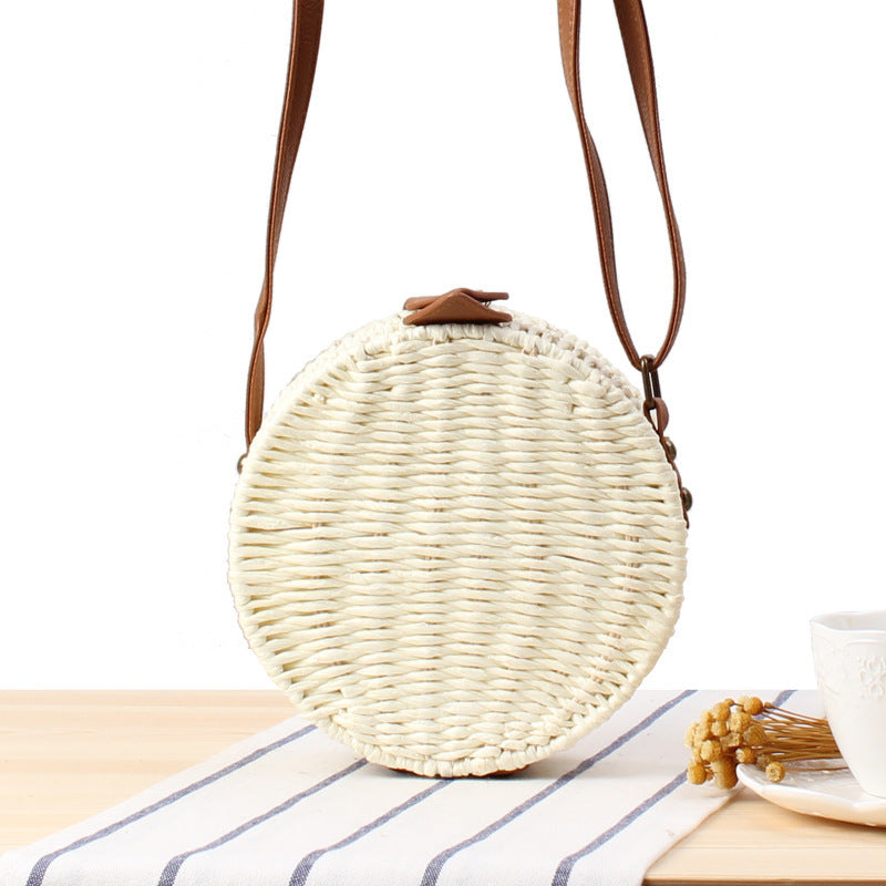 Round basket bag with leather accents Kalsten
