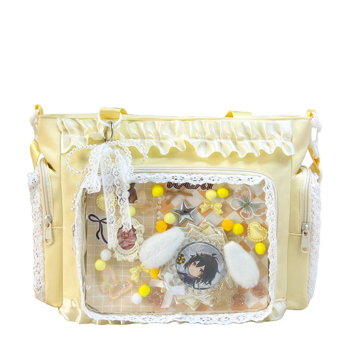 Shoulder bag with transparent front and playful applications Kalsten