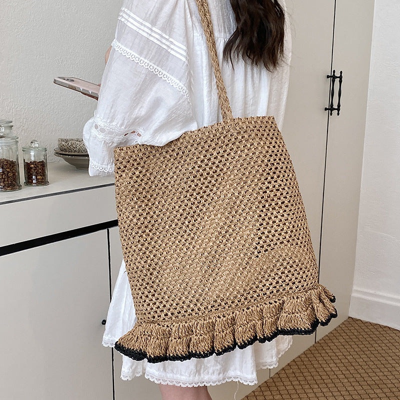 Handcrafted straw bag with fringed hem Kalsten