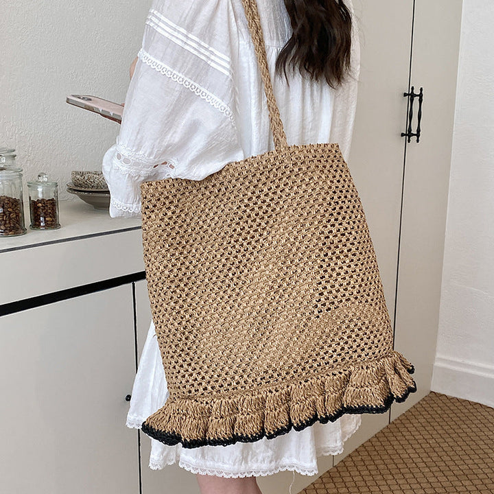 Handcrafted straw bag with fringed hem Kalsten