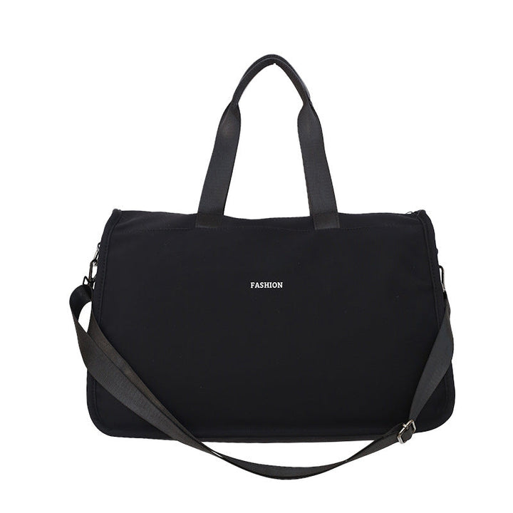 Sporty travel bag with ergonomic carrying handles and versatile compartments Kalsten