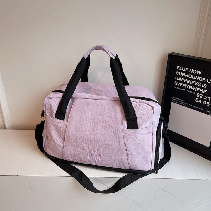 Sporty travel bag with practical outer pockets Kalsten