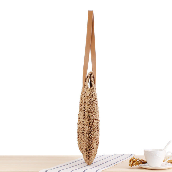 Round straw bag with leather handles Kalsten