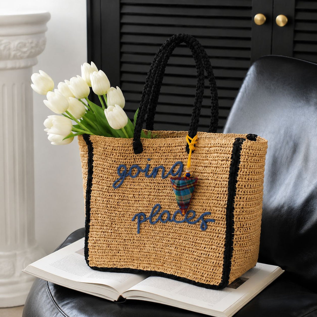 Leisure bag made of woven natural material with colorful pendant Kalsten