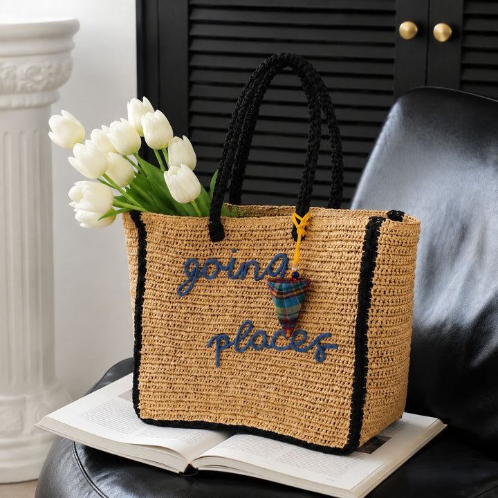 Leisure bag made of woven natural material with colorful pendant Kalsten