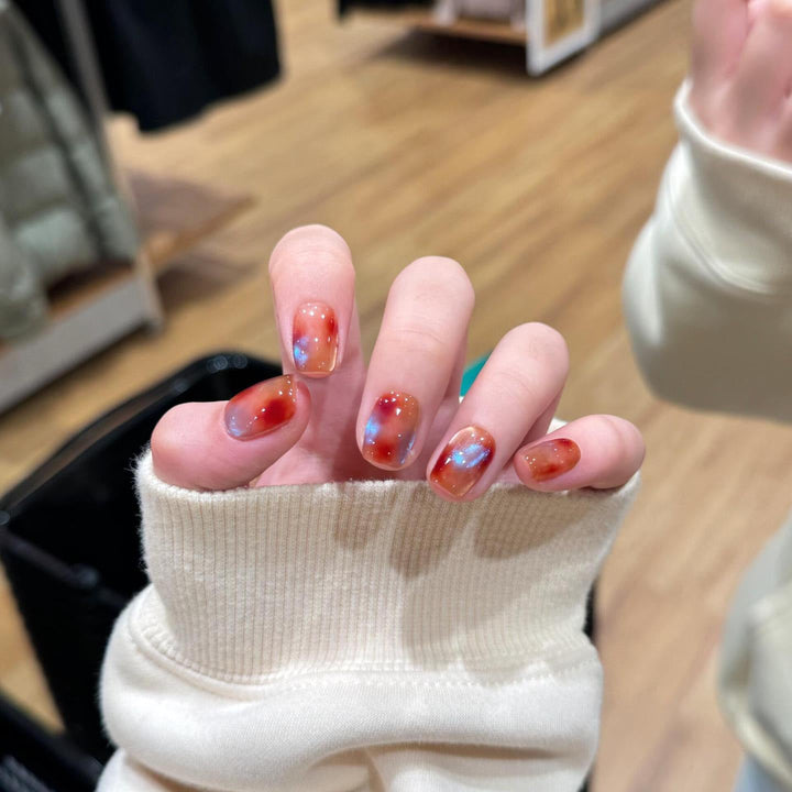 Artificial nails with shimmering galaxy patterns Kalsten