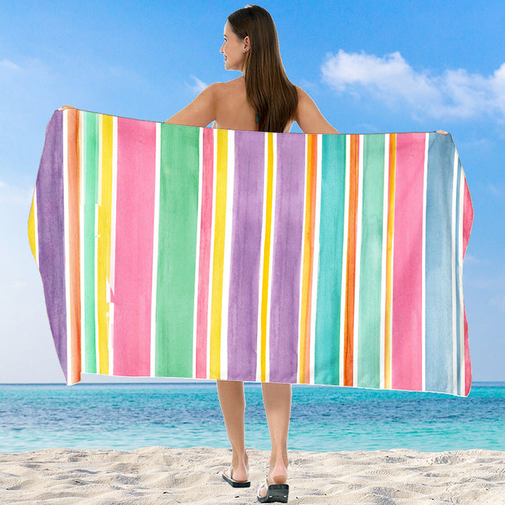 Beach towel with vibrant gradient color and stylish striped design Kalsten