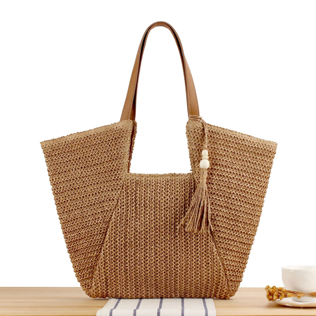 Handbag Made of Handwoven Raffia with Elegant Leather Accents Kalsten