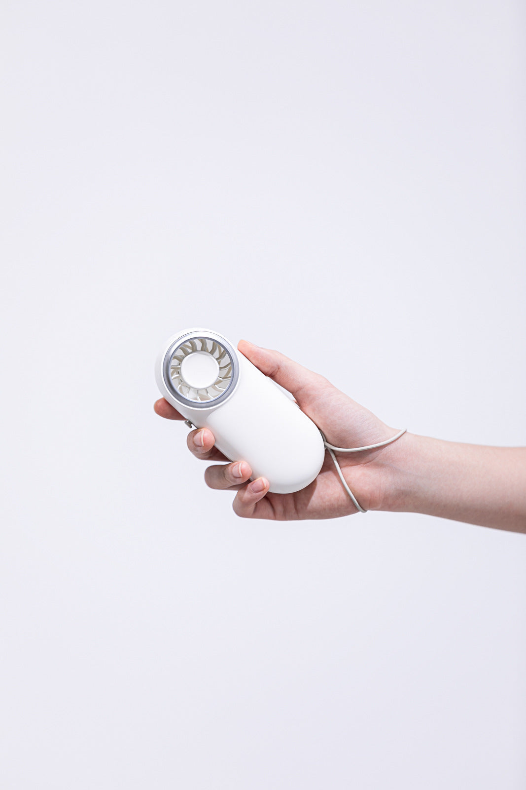 Unisex nan compact rechargeable handheld fan with ergonomic grip and carrying strap Kalsten