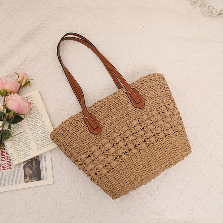 Handcrafted rattan basket bag with elegant leather accents Kalsten