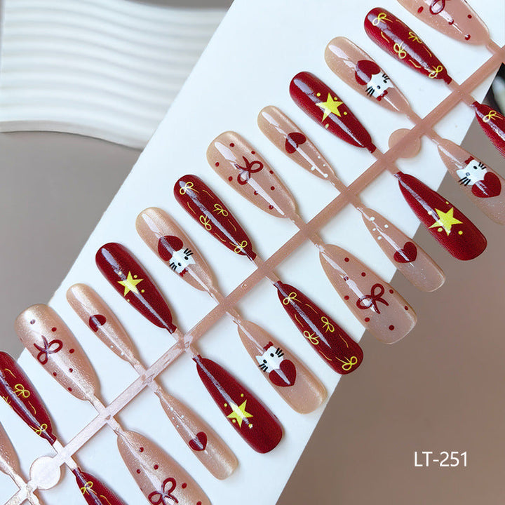 Artificial nails in festive Christmas design Kalsten