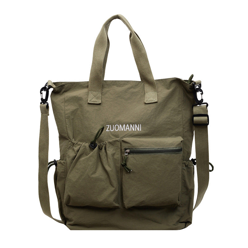 Tote bag with multifunctional outer pockets and adjustable shoulder strap Kalsten
