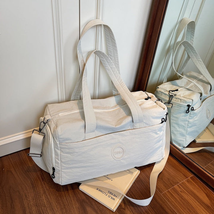 Sporty travel bag with practical exterior pockets Kalsten