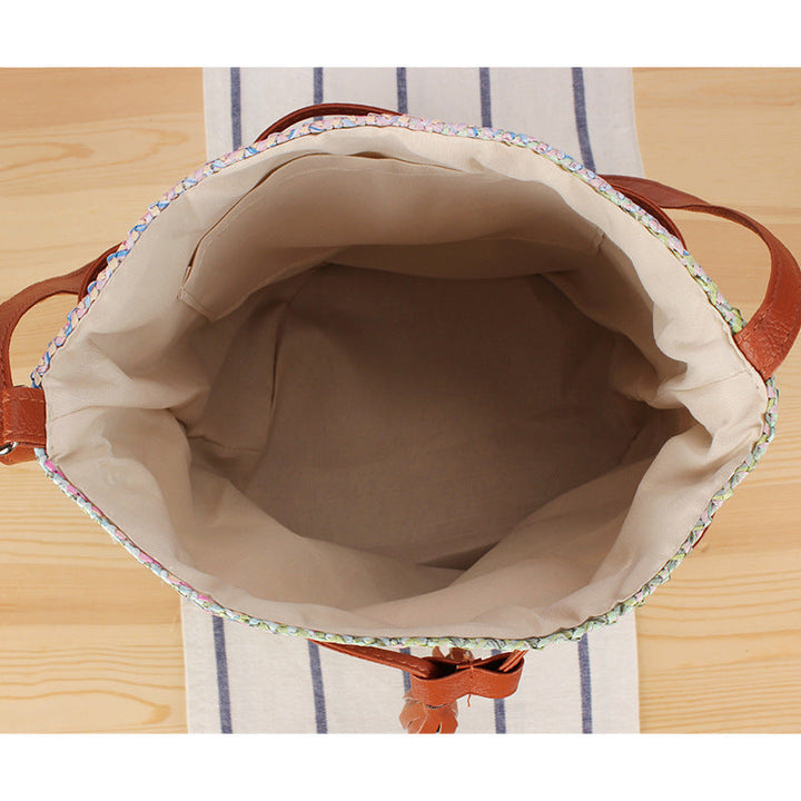 Shoulder bag made of hand-woven natural material with stylish leather accents Kalsten