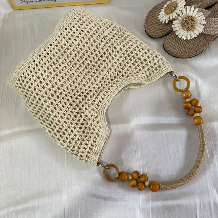 Hand-knotted tote bag with decorative wooden handle Kalsten