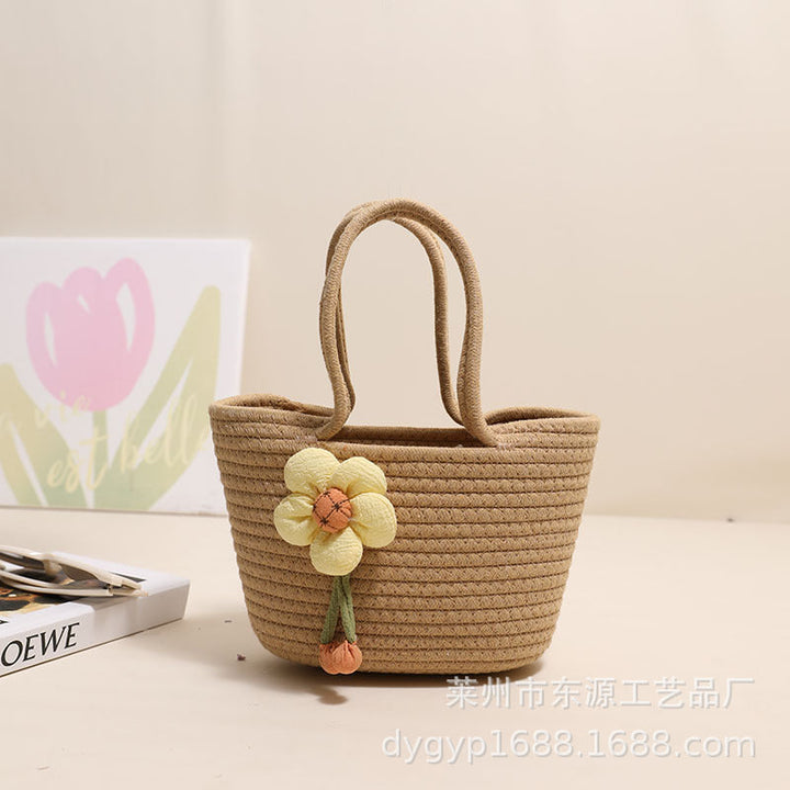 Handcrafted basket bag with floral accents Kalsten