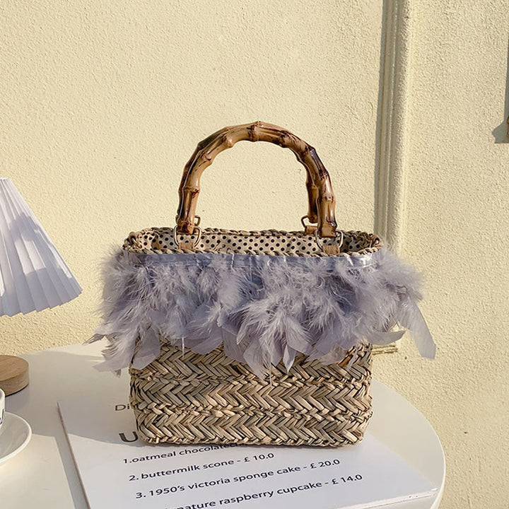 Elegant handbag with feathers and bamboo handles Kalsten