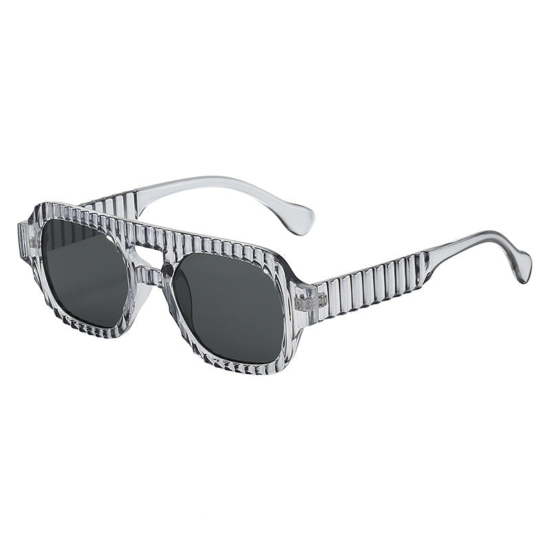 Ladies fashionable sunglasses in futuristic design with textured frame Kalsten