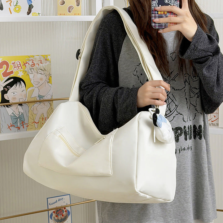 Sporty shoulder bag with spacious interior and sturdy carrying strap Kalsten