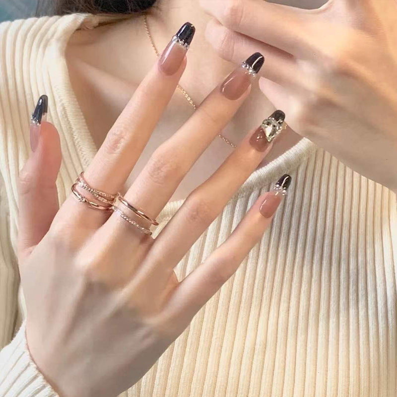 Artificial nails with heart design and glamorous accents Kalsten