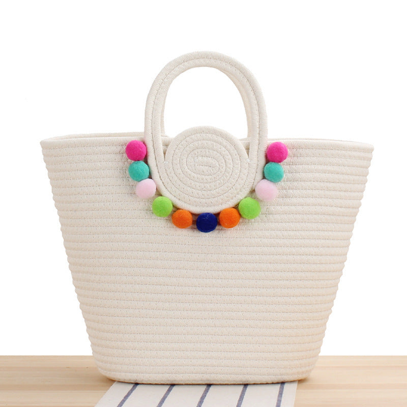 Fashionable handbag with playful pompom decoration Kalsten
