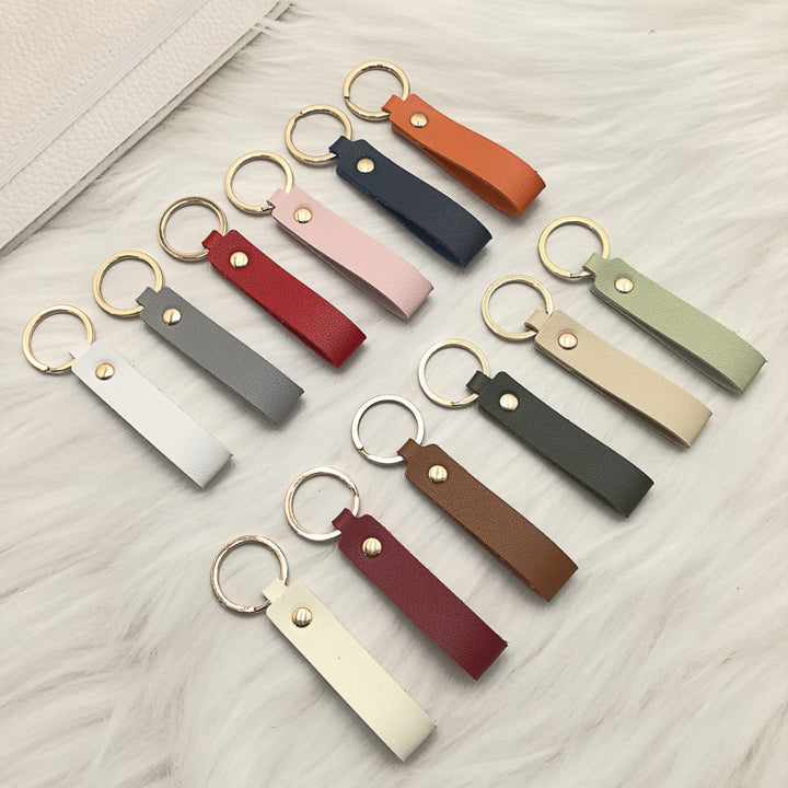 Unisex keychain made of high-quality synthetic leather with elegant metal embellishment Kalsten