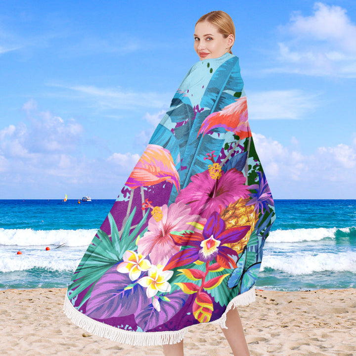 Round beach towel with tropical leaf print and fringe decoration Kalsten