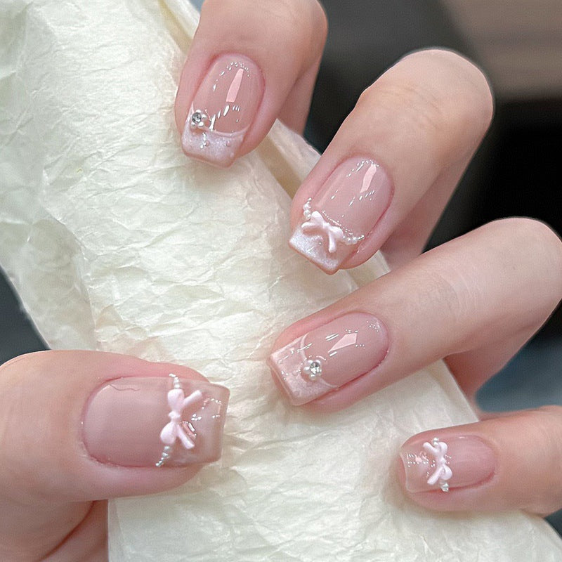 Elegant French Tip Press-On Nail Art with Bow Accents Kalsten