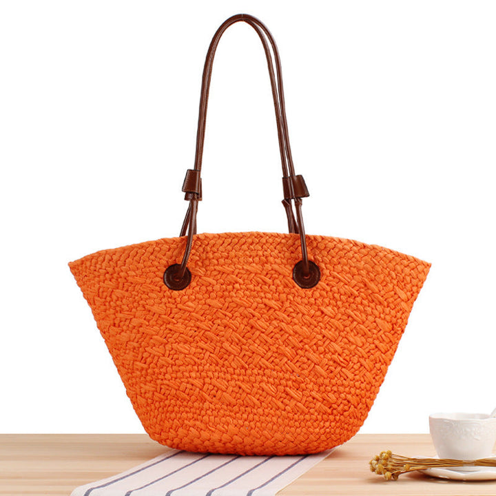 Beach bag made of high-quality braided straw with stylish leather handles Kalsten