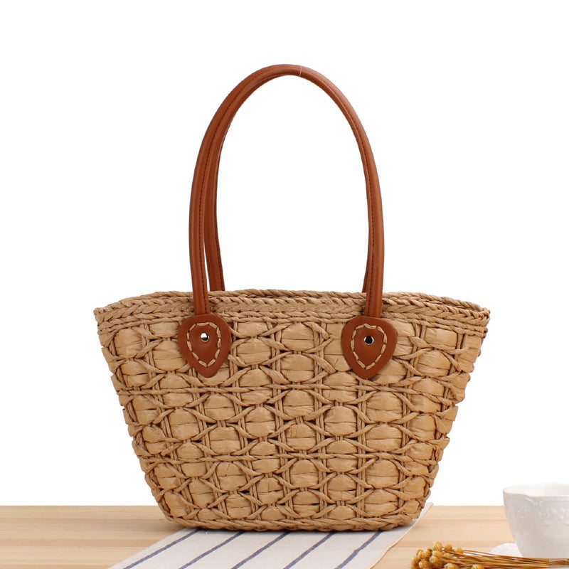 Handcrafted wicker bag with elegant leather accents Kalsten