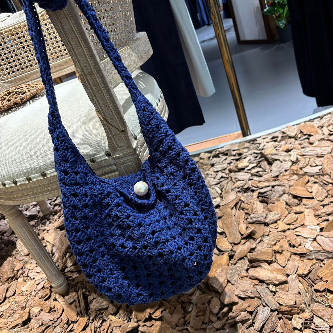 Hand-knotted shoulder bag with bead closure Kalsten