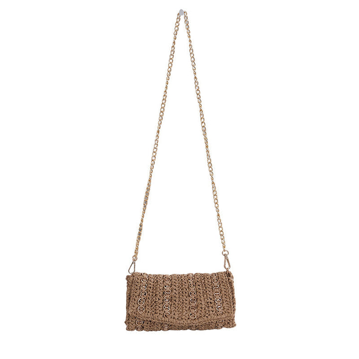 Clutch with chain shoulder strap and handcrafted macrame closure Kalsten