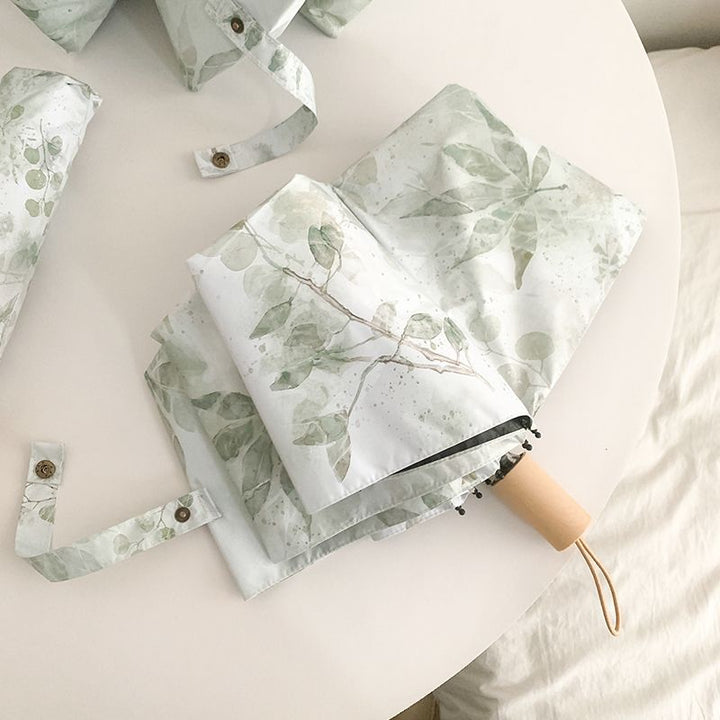 Women's folding umbrella with botanical print design Kalsten